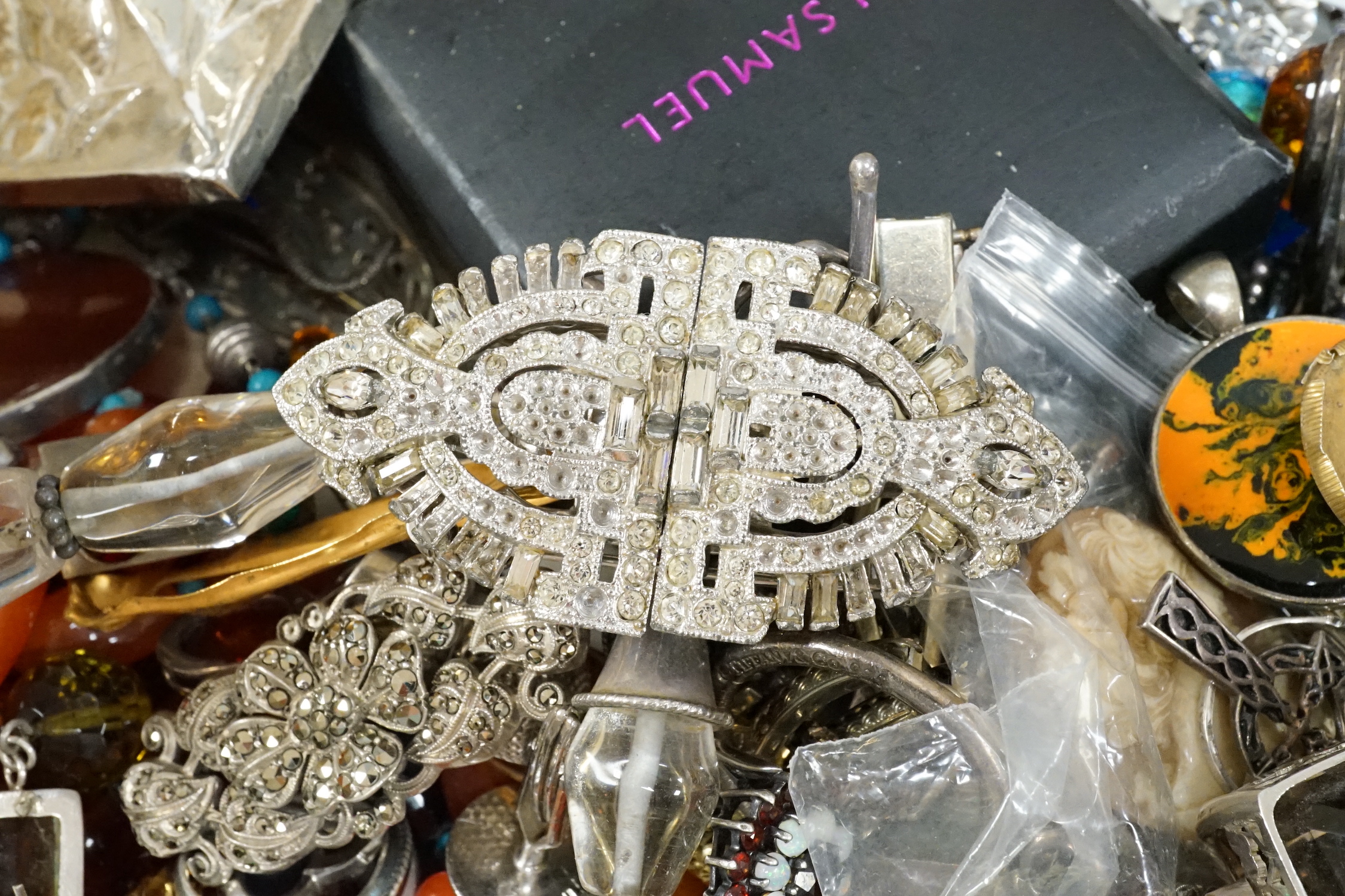 A quantity of assorted jewellery, including silver, white metal and costume and a pair of silver mounted dwarf candlesticks(a.f.).